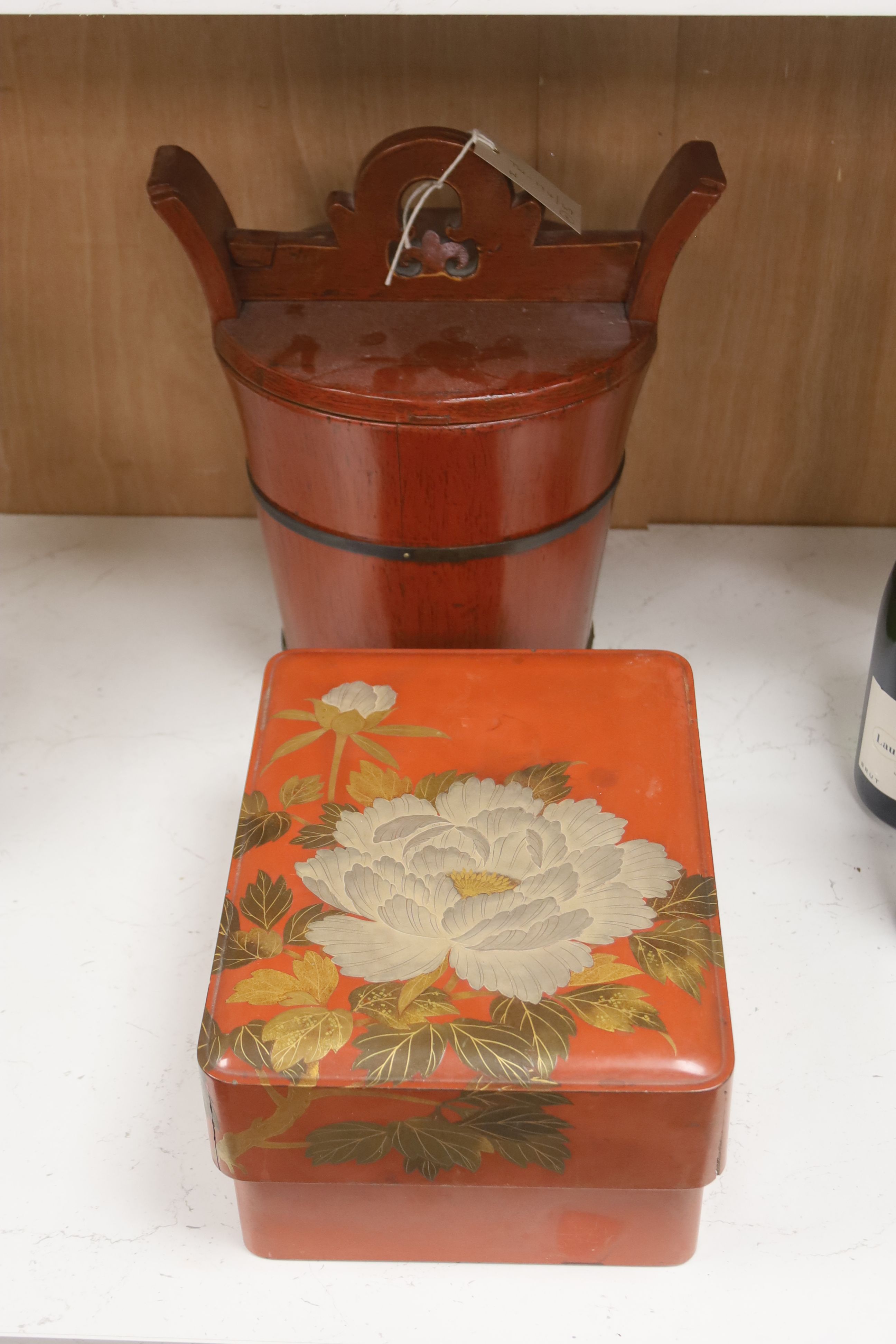 A Chinese red-lacquered rice container and cover and a similar Japanese rectangular box and cover (2)